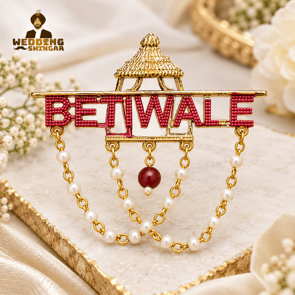 Betiwale wedding brooch with red beaded lettering, gold-tone frame and pearl chains for safa or coat.
